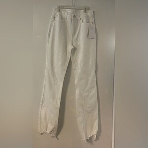 White jeans with fringe leg